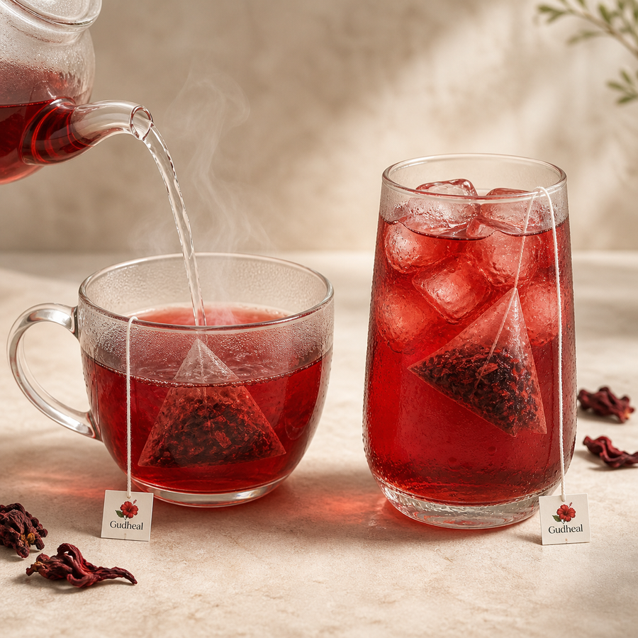 Gudheal Hibiscus tea served hot and iced in clear glasses